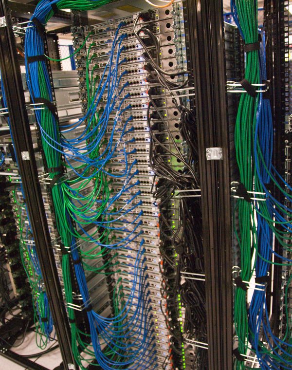 Colorful network cables in a rack